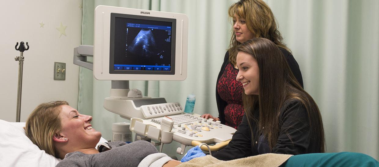 Students performing an ultrasound